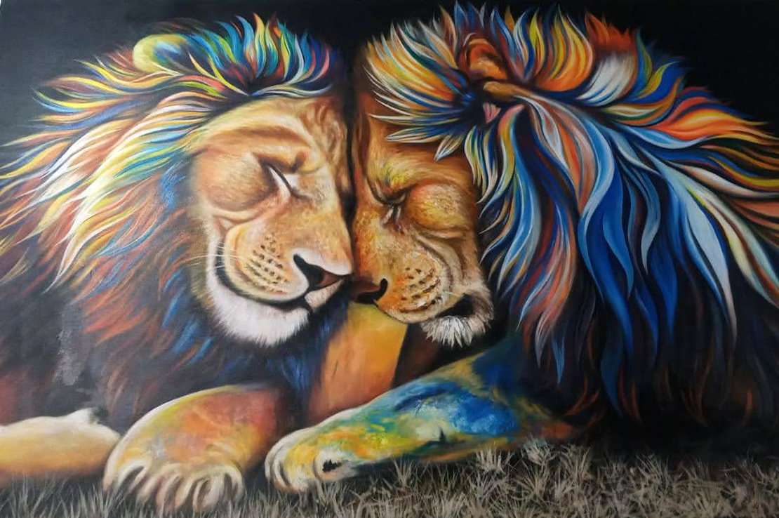 Lion / male lion facing each other